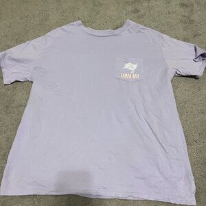 Worn once purple Buccaneers shirt with puppy on the back
